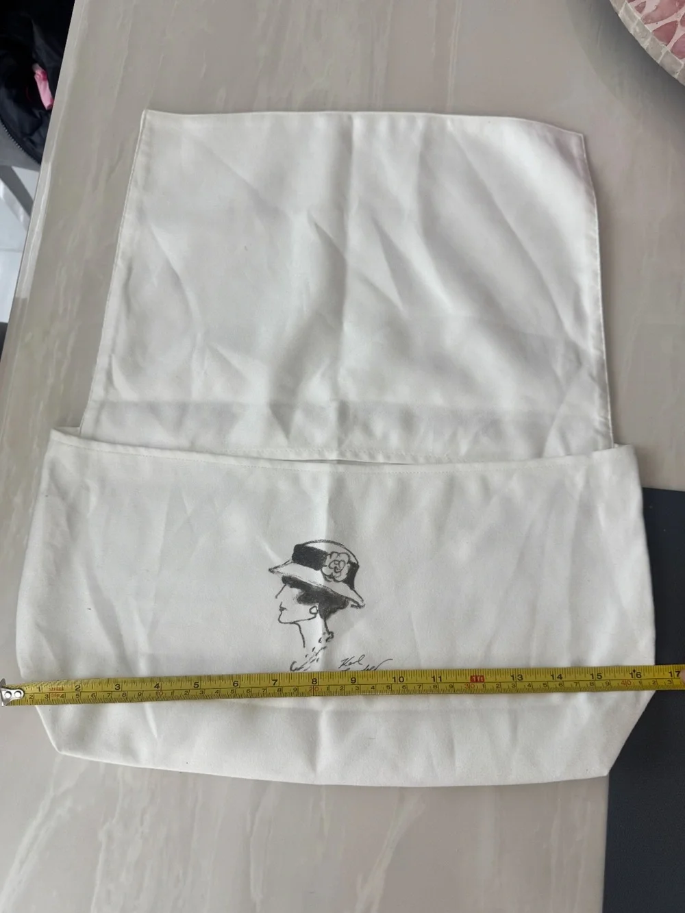 CHANEL White Dust Bag with Black Quilted Grid